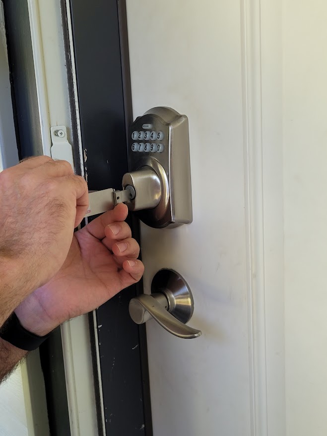 Locksmith helping a homeowner in Clearwater